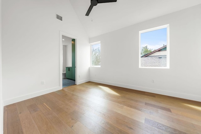 1703 Miami Dr, Austin, TX 78733 - empty room with a ceiling fan, hardwood / wood-style floors, and high vaulted ceiling