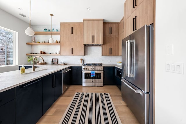 1703 Miami Dr, Austin, TX 78733 - kitchen featuring high end appliances, light stone counters, light wood finished floors, open shelves, and tasteful backsplash