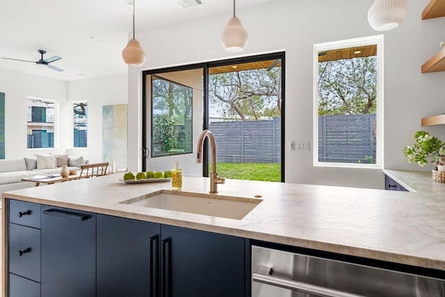 1703 Miami Dr, Austin, TX 78733 - kitchen featuring hanging light fixtures, open shelves, blue cabinets, wine cooler, and open floor plan