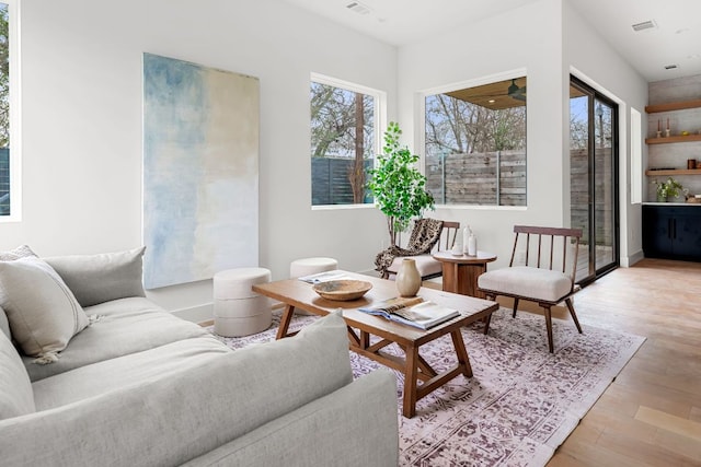 1703 Miami Dr, Austin, TX 78733 - living room with plenty of natural light and light wood-type flooring