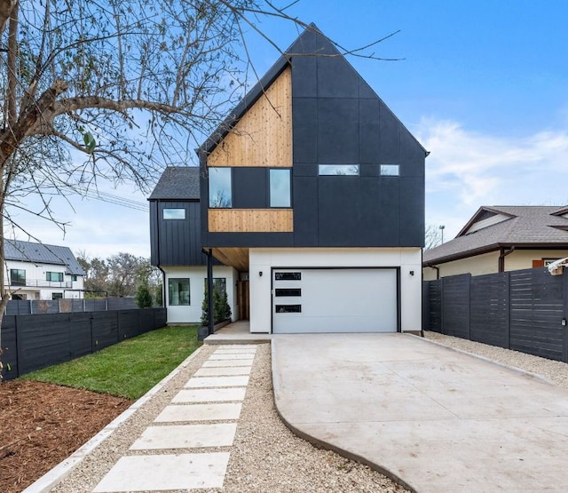 1703 Miami Dr, Austin, TX 78733 - contemporary home with driveway and an attached garage