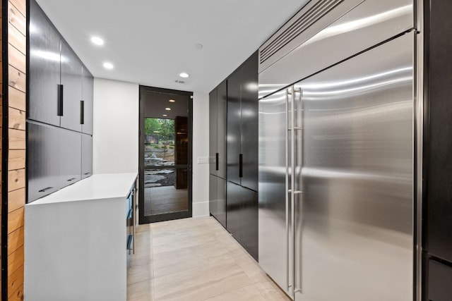 4904 Old Bee Caves Rd, Austin, TX 78746 - kitchen with modern cabinets, recessed lighting, light countertops, built in refrigerator, and elevator