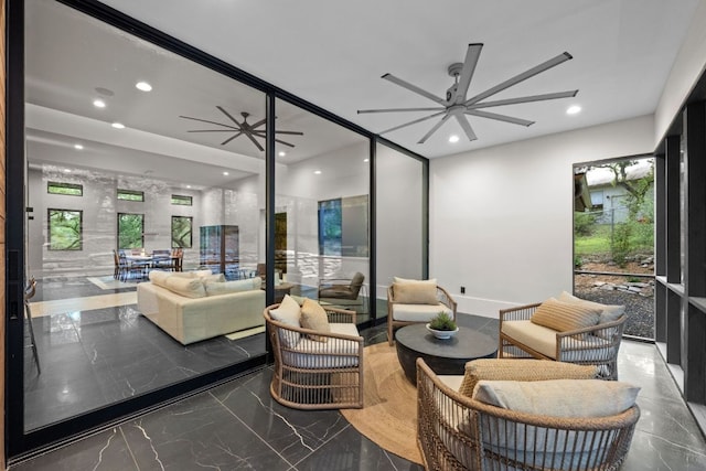 4904 Old Bee Caves Rd, Austin, TX 78746 - living room featuring ceiling fan, marble tiled floors, recessed lighting, and healthy amount of natural light