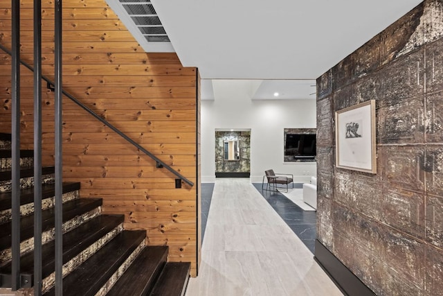 4904 Old Bee Caves Rd, Austin, TX 78746 - stairway with wood walls and recessed lighting