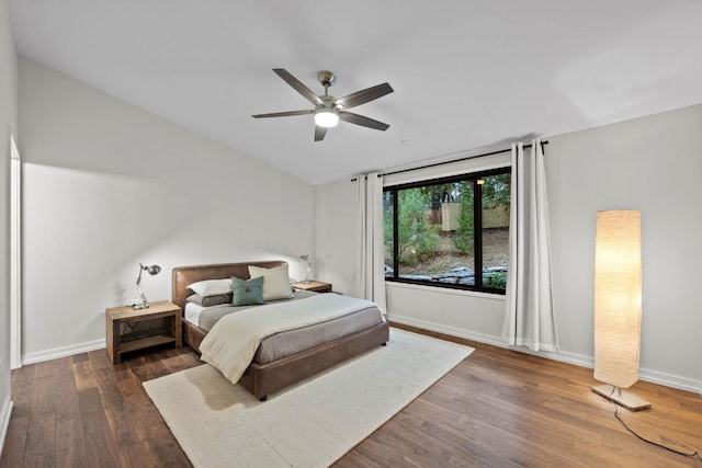 4904 Old Bee Caves Rd, Austin, TX 78746 - bedroom featuring lofted ceiling, wood finished floors, and a ceiling fan