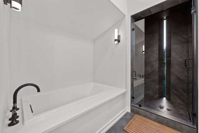 4904 Old Bee Caves Rd, Austin, TX 78746 - bathroom featuring a garden tub, a shower stall, and tile patterned floors
