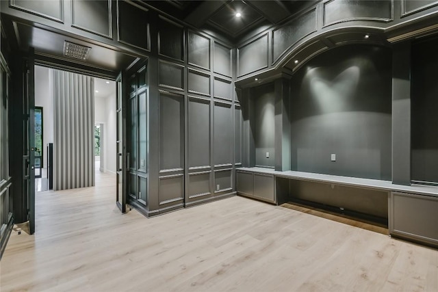 5217 S Scout Island Cir, Austin, TX 78731 - spare room with a decorative wall, light wood finished floors, and recessed lighting