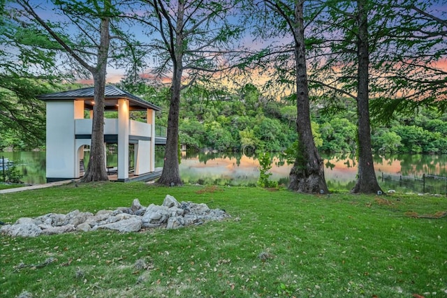 5217 S Scout Island Cir, Austin, TX 78731 - yard at dusk with a water view