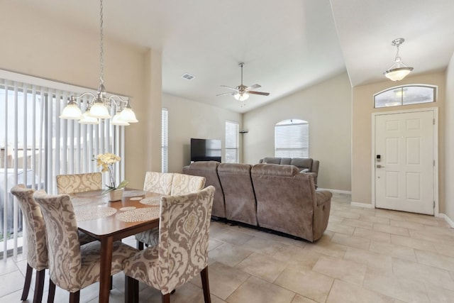 7233 Menchaca Rd Unit 22, Austin, TX 78745 - dining space with a chandelier, ceiling fan, and lofted ceiling