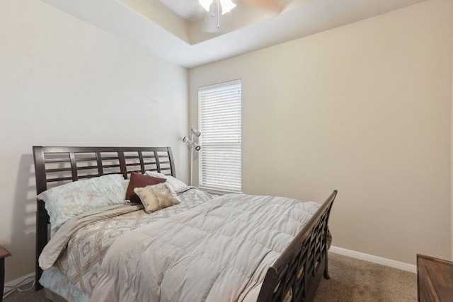 7233 Menchaca Rd Unit 22, Austin, TX 78745 - carpeted bedroom with a raised ceiling and ceiling fan