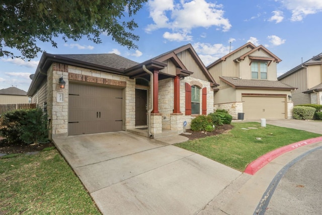 7233 Menchaca Rd Unit 22, Austin, TX 78745 - craftsman-style home featuring driveway, stone siding, roof with shingles, a garage, and a front lawn