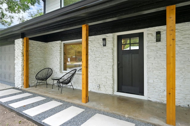 2114 Vanderbilt Ln, Austin, TX 78723 - property entrance featuring stone siding and covered porch