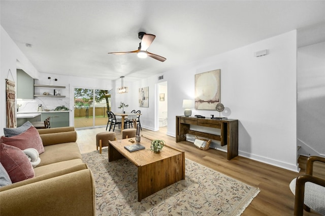 2114 Vanderbilt Ln, Austin, TX 78723 - living area featuring a ceiling fan and wood finished floors