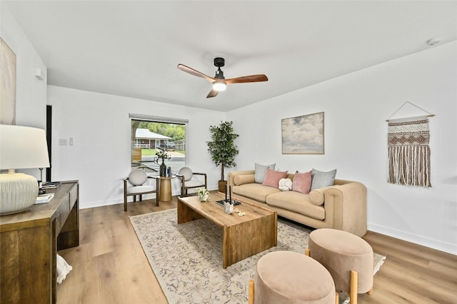 2114 Vanderbilt Ln, Austin, TX 78723 - living area with wood finished floors and ceiling fan