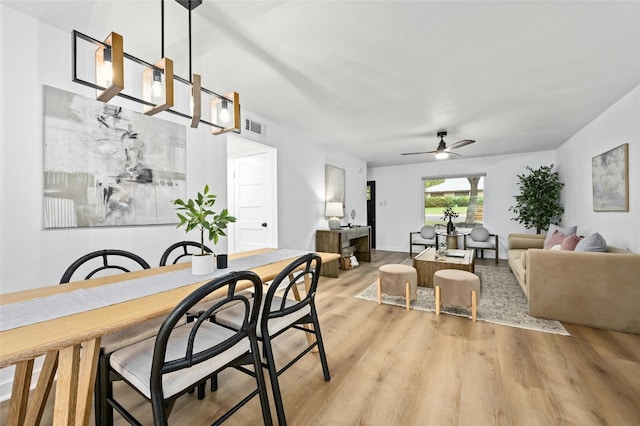 2114 Vanderbilt Ln, Austin, TX 78723 - dining area with light wood-type flooring and a ceiling fan