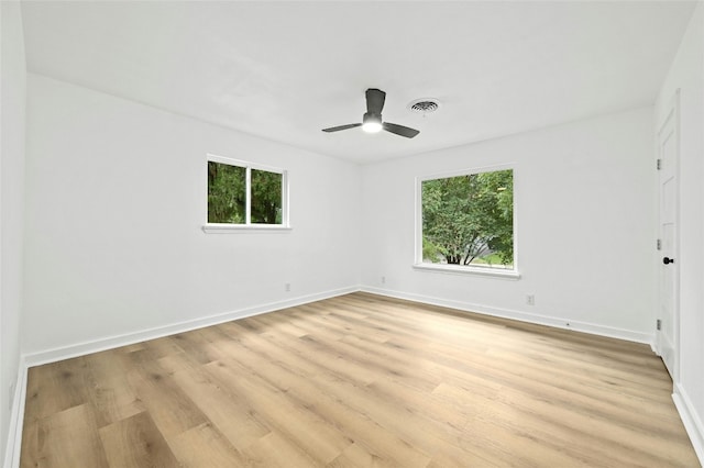 2114 Vanderbilt Ln, Austin, TX 78723 - unfurnished room featuring light wood-type flooring and ceiling fan