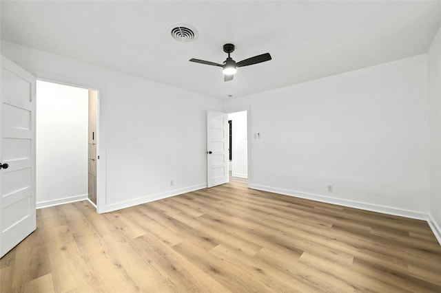 2114 Vanderbilt Ln, Austin, TX 78723 - unfurnished bedroom with light wood-type flooring and ceiling fan