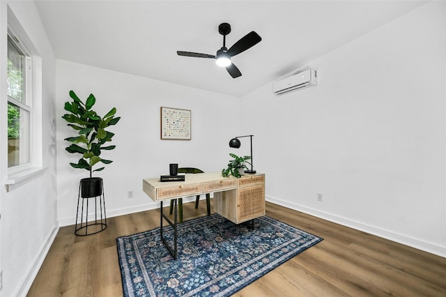 2114 Vanderbilt Ln, Austin, TX 78723 - home office with an AC wall unit, wood finished floors, and ceiling fan