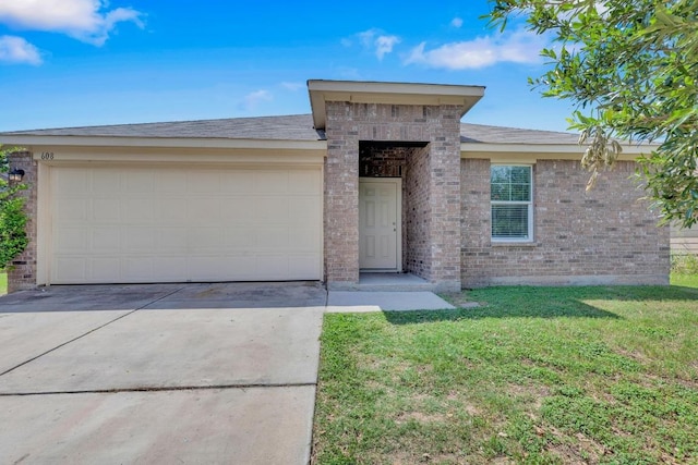608 Silver Wing Dr, Austin, TX 78725 - ranch-style home with concrete driveway, a garage, a front yard, and brick siding