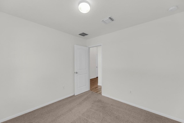 608 Silver Wing Dr, Austin, TX 78725 - spare room with carpet floors and a smoke detector