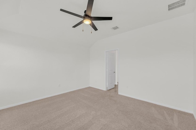 608 Silver Wing Dr, Austin, TX 78725 - empty room with light carpet, ceiling fan, and lofted ceiling
