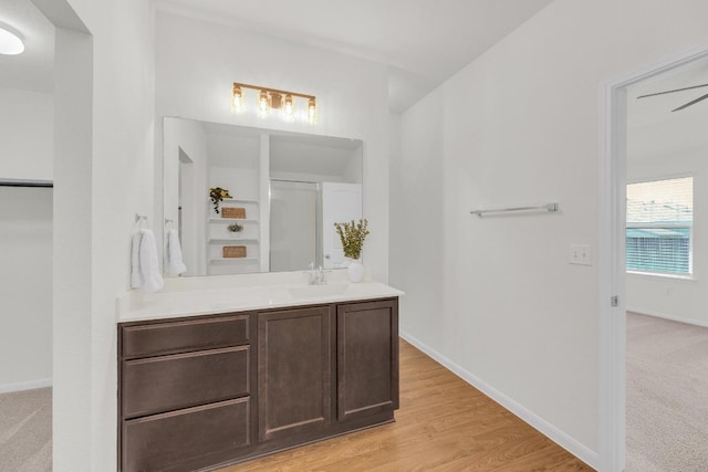 608 Silver Wing Dr, Austin, TX 78725 - bathroom with vanity and wood finished floors