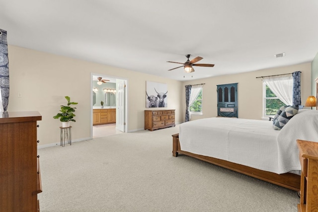 11551 Fm 32, Fischer, TX 78623 - bedroom with carpet floors, a ceiling fan, and ensuite bath