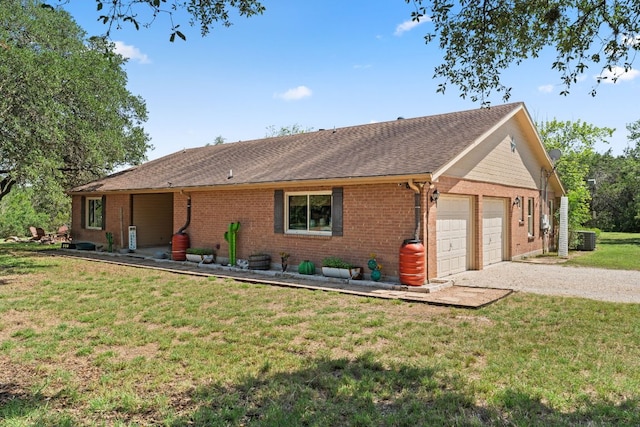 11551 Fm 32, Fischer, TX 78623 - single story home with an attached garage, brick siding, gravel driveway, a front lawn, and roof with shingles