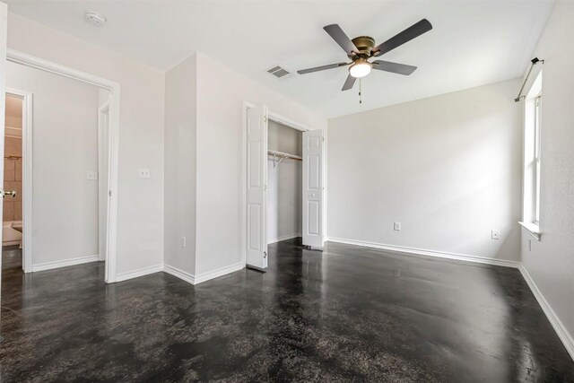 613 Broken Bow Dr, Round Rock, TX 78681 - unfurnished bedroom with finished concrete flooring, a closet, and a ceiling fan