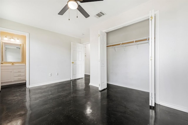 613 Broken Bow Dr, Round Rock, TX 78681 - unfurnished bedroom with a closet, finished concrete flooring, ensuite bathroom, and ceiling fan