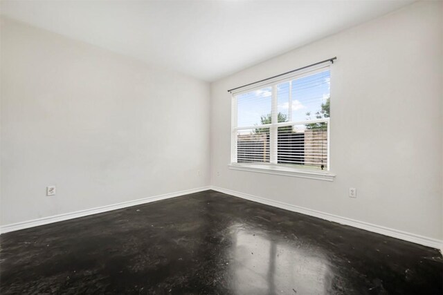 613 Broken Bow Dr, Round Rock, TX 78681 - empty room featuring concrete flooring and baseboards