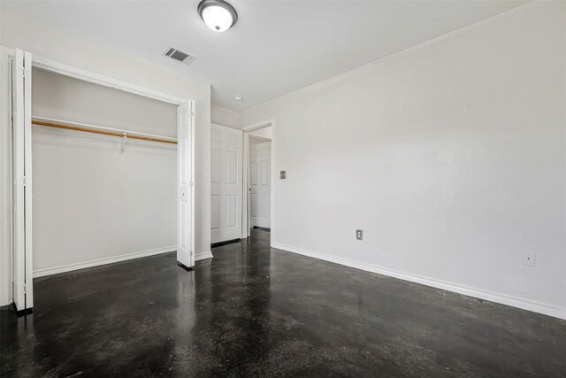 613 Broken Bow Dr, Round Rock, TX 78681 - unfurnished bedroom with concrete flooring and a closet