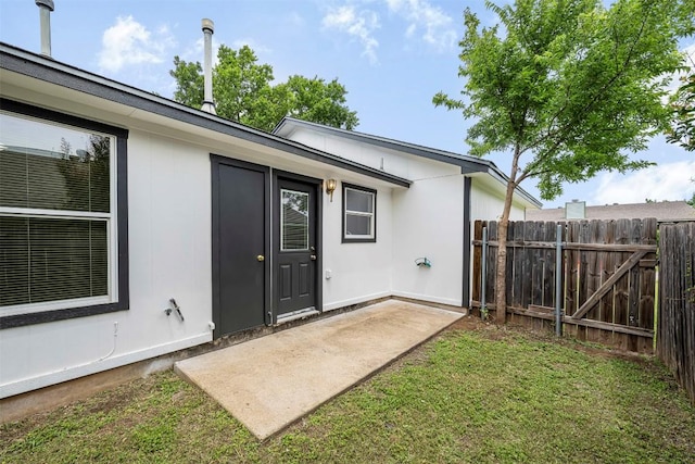 613 Broken Bow Dr, Round Rock, TX 78681 - view of exterior entry featuring a patio