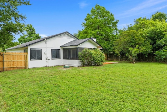 13402 Briar Hollow Dr, Austin, TX 78729 - rear view of house featuring a sunroom
