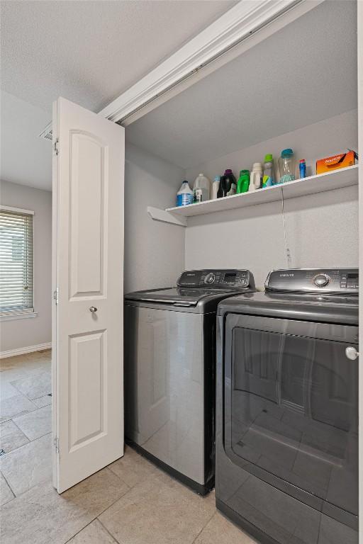 3011 Wadsworth Way, Austin, TX 78748 - washroom featuring washer and clothes dryer