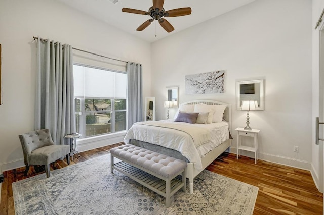 10129 Longhorn Skwy, Dripping Springs, TX 78620 - bedroom featuring wood finished floors and ceiling fan