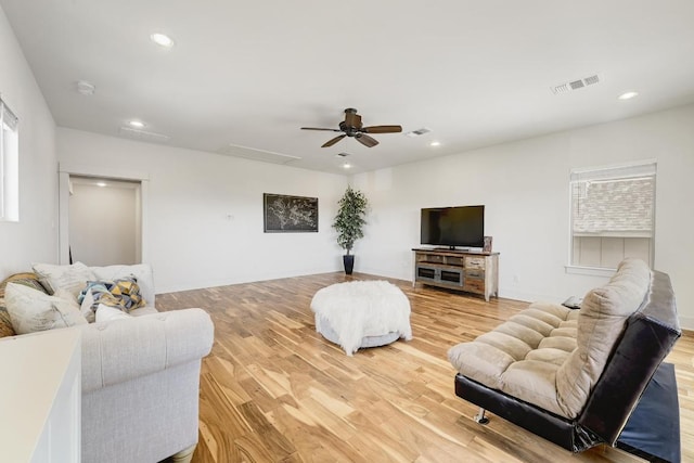 10129 Longhorn Skwy, Dripping Springs, TX 78620 - living room with healthy amount of natural light, light wood finished floors, recessed lighting, and ceiling fan