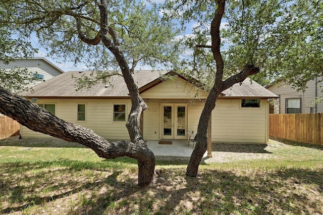 10129 Longhorn Skwy, Dripping Springs, TX 78620 - back of house featuring french doors and roof with shingles