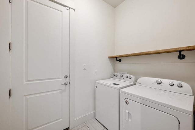 10129 Longhorn Skwy, Dripping Springs, TX 78620 - laundry area featuring washing machine and dryer and baseboards