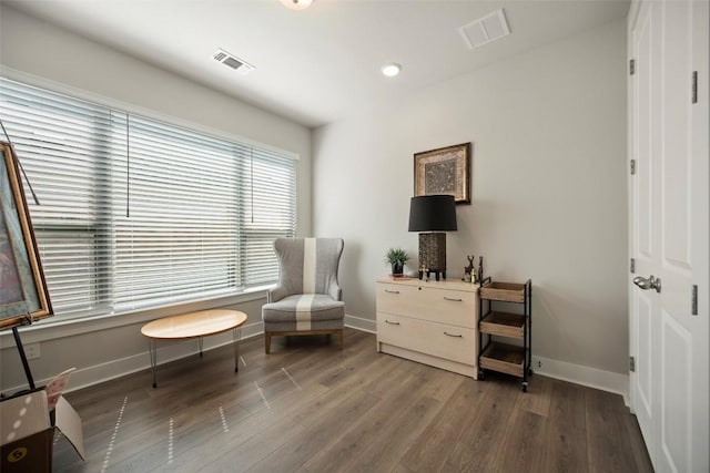 1113 Spring Gulch Ln, Georgetown, TX 78628 - sitting room with wood finished floors and recessed lighting