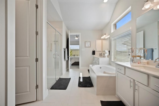 1113 Spring Gulch Ln, Georgetown, TX 78628 - ensuite bathroom with a stall shower, a bath, vanity, tile patterned floors, and a ceiling fan