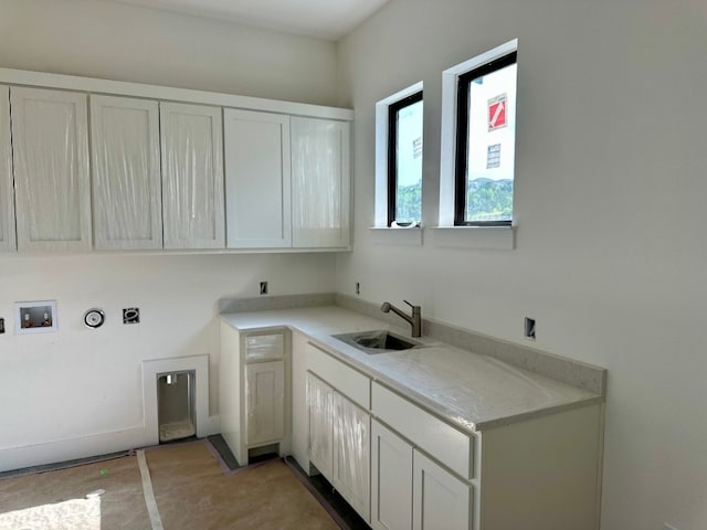 969 Tomichi Trl, Lakeway, TX 78738 - laundry area with cabinet space, washer hookup, and gas dryer hookup