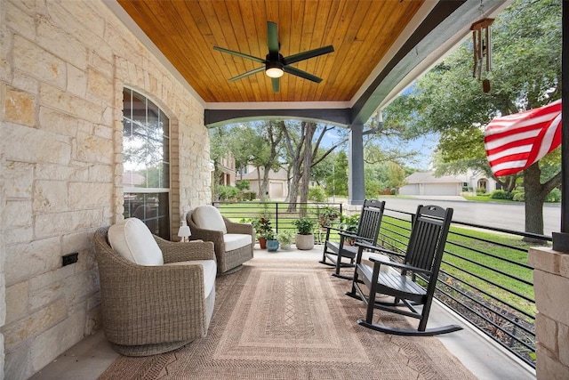 7308 Black Mountain Dr, Austin, TX 78736 - covered porch with ceiling fan and a yard
