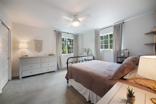 7308 Black Mountain Dr, Austin, TX 78736 - carpeted bedroom featuring a ceiling fan