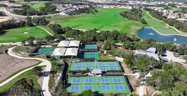 217 Skipping Cedar St, San Marcos, TX 78666 - aerial view of property and surrounding area featuring a local golf course, a nearby body of water, and nearby suburban area