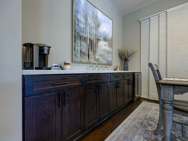 217 Skipping Cedar St, San Marcos, TX 78666 - bar area with dark wood-style flooring