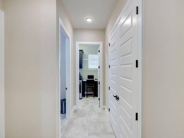 217 Skipping Cedar St, San Marcos, TX 78666 - hallway featuring baseboards and a desk