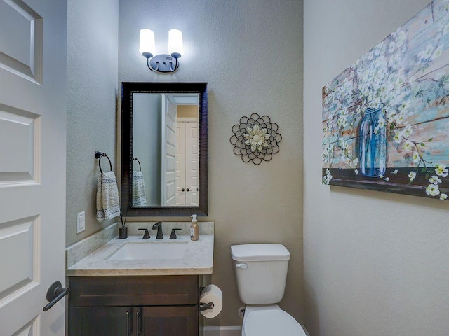 217 Skipping Cedar St, San Marcos, TX 78666 - bathroom featuring vanity and toilet