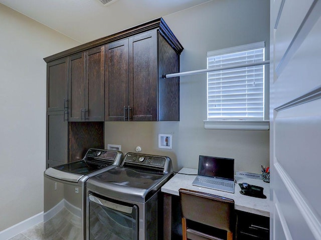 217 Skipping Cedar St, San Marcos, TX 78666 - washroom with washing machine and clothes dryer, cabinet space, and a desk