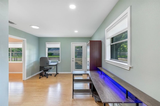 420 Hale St, Lexington, TX 78947 - home office with healthy amount of natural light, wood finished floors, and recessed lighting